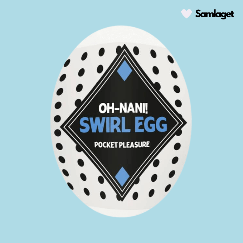 Oh-Nani! Swirl Egg, ett äggformat onanihjälpmedel för män. Ägget är vitt med svarta prickar och en svart diamantformad etikett på framsidan