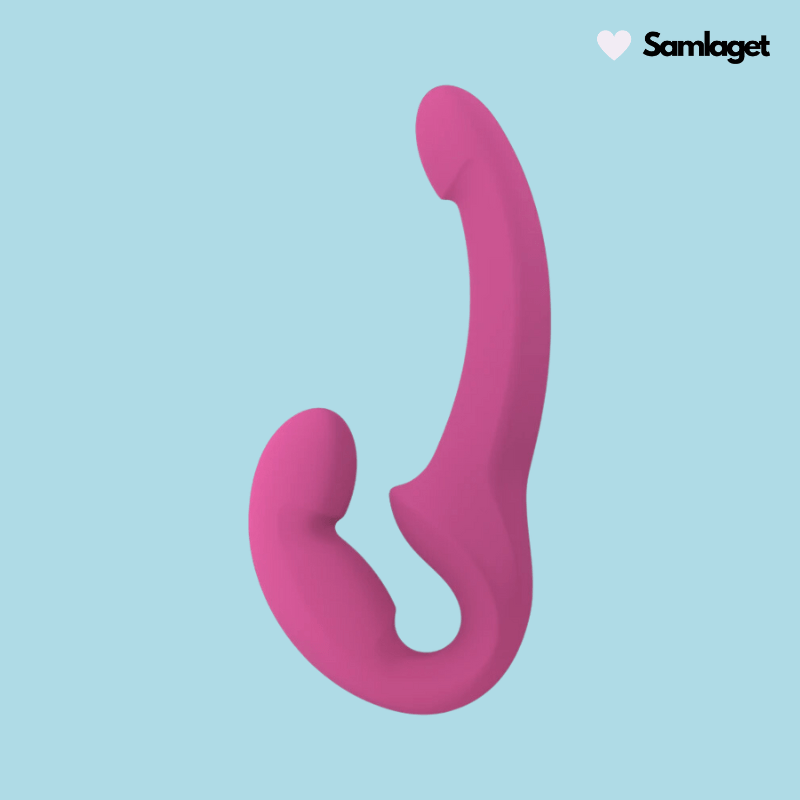 Fun Factory Share Lite dubbeldildo i rosa, ergonomisk design för både bäraren och partnerns stimulans.